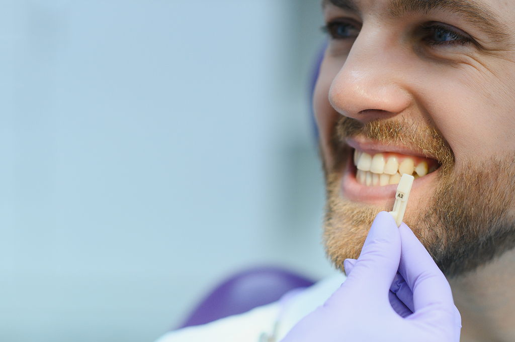 Man in dental office in Winnipeg with Porcelain Veneers