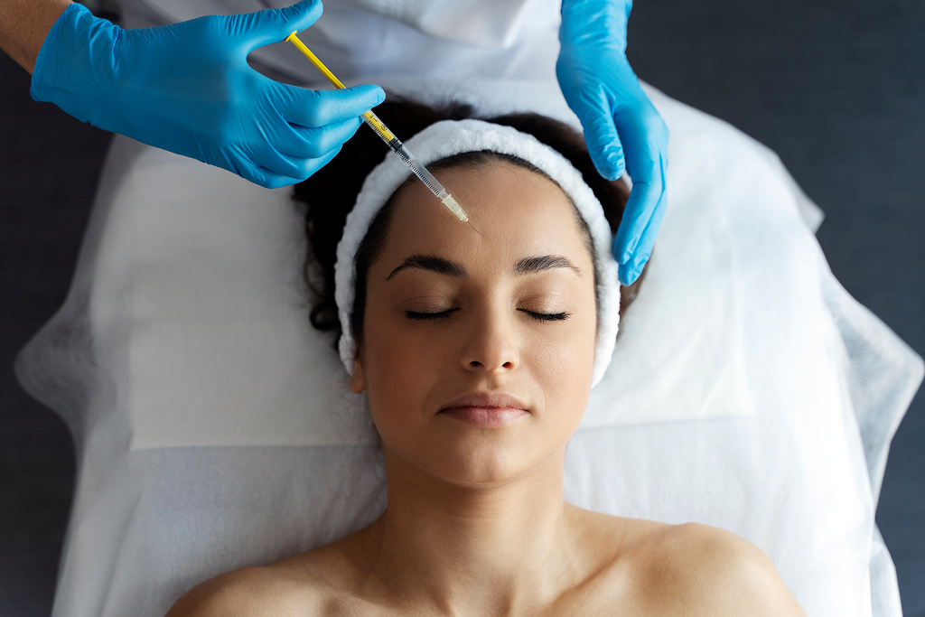 Woman during botox treatment relaxed