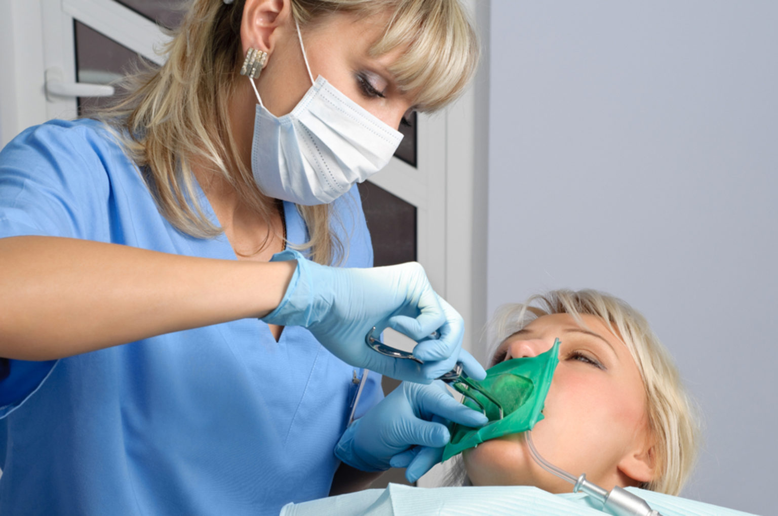 how does a dentist perform root canal treatment
