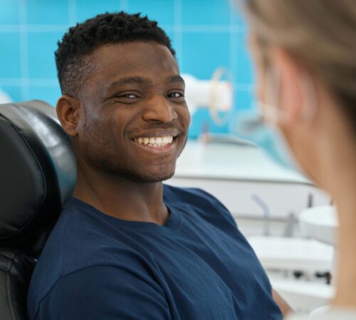 patient-smiling prosthodontics services in winnipeg