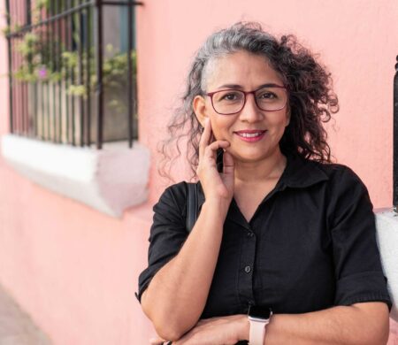 woman smiling post her dental botox