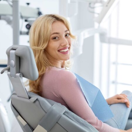 woman smiling after tooth reshaping tooth reshaping & contouring done on a woman